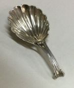 A good Victorian silver caddy spoon with fluted bo