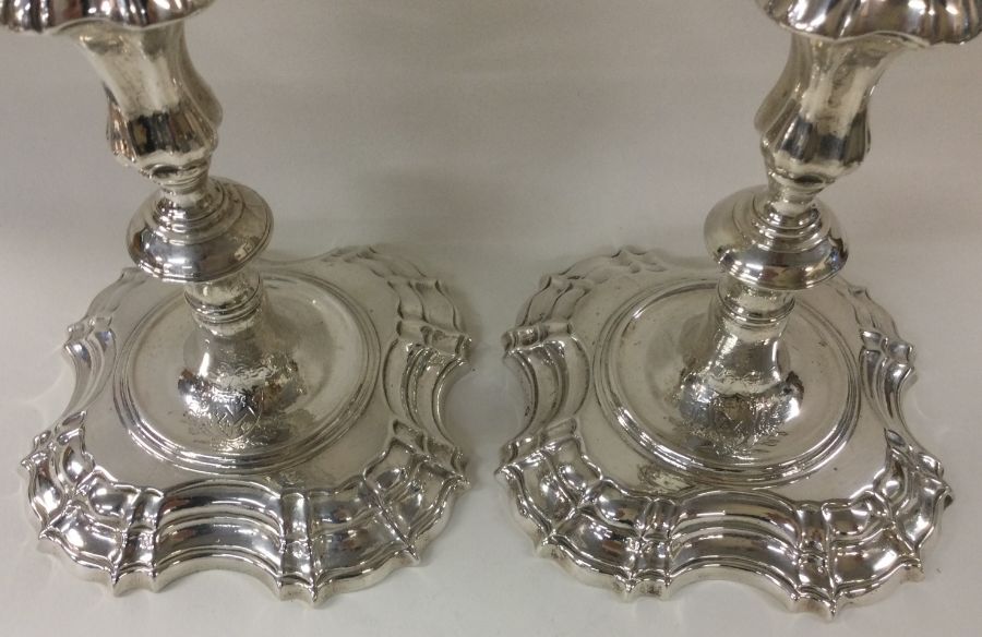 A fine pair of George II cast silver candlesticks - Image 2 of 3