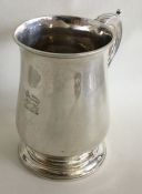 A good heavy George III baluster shaped silver mug