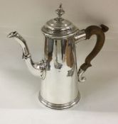 A straight sided silver coffee pot. London circa 1