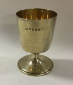 A George III silver gilt travelling goblet with de