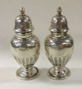 A pair of Victorian silver casters. Sheffield 1896