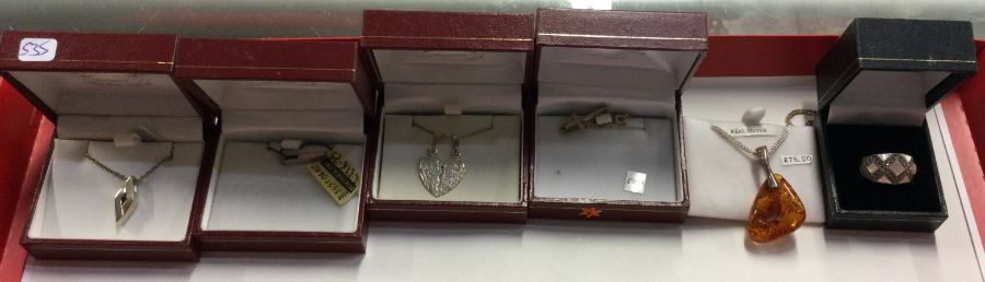 Six boxes of silver earrings, pendants etc. Est. £