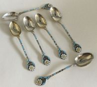 An attractive set of six silver and enamelled coff
