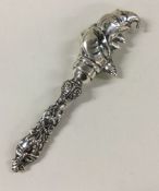 A Sterling silver baby's rattle in the form of a m