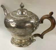 A Georgian style silver teapot. London 1903. By Ch