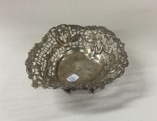 A large silver heart shaped bonbon dish. London. A