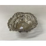 A large silver heart shaped bonbon dish. London. A