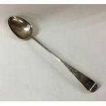 A Georgian silver basting spoon. London. By WP. Ap