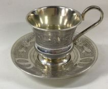 A Russian silver kiddish cup on stand. Marked to b