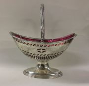 A pierced swing handled sil;ver basket. London 1795