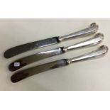A set of three heavy silver handled knives. Approx