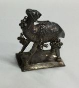 A Continental silver figure of a camel on square t