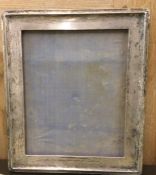 A large oak framed and silver mounted picture fram