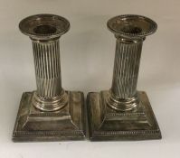 A pair of Victorian silver corinthian column candl