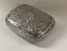 A chased silver snuff box with cherubs. Est. £150