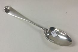 A small Hanoverian pattern silver dessert spoon. L