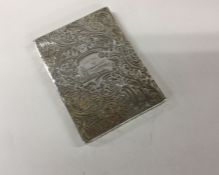 A chased silver card case. Birmingham 1905. By Joh