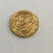 A 1925 gold sovereign. Est. £250 - £350.