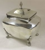 A silver tea caddy on feet. Birmingham 1901. By Th