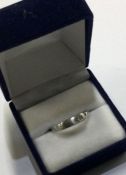 A small 9 carat diamond single stone ring. Approx.