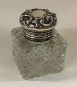 A Sterling silver chased scent bottle. Est. £20 -