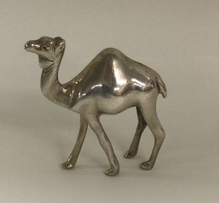 A modern silver camel. Approx. 20grams. Est. £20 -
