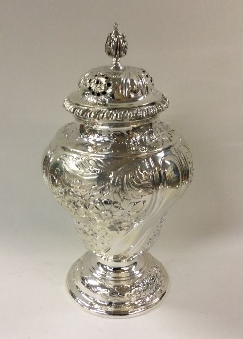 A Victorian silver heavy chased sugar caster. Lond - Image 2 of 2