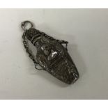 An unusual silver plated scent bottle with chain w