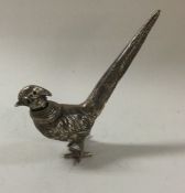 A Dutch silver pepper in the form of a bird. Approx.