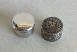 A Continental silver pill box together with one ot