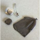 A plain silver pill box together with a purse etc.
