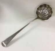 A bright cut silver engraved fluted soup ladle. Lo