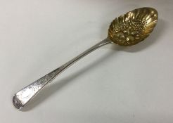 A George III fruit serving silver spoon. London 18