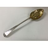 A George III fruit serving silver spoon. London 18