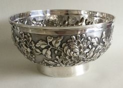 A good circular Chinese silver bowl decorated with