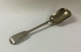 A heavy silver fiddle pattern caddy scoop. London.