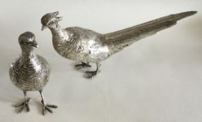 A good pair of heavy cast silver pheasants with te