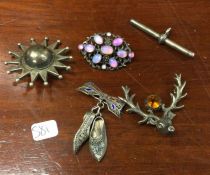 A silver brooch together with a pendant etc. Est.