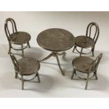 A set of four miniature Chinese silver chairs and