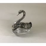 A Sterling silver and glass model of a swan with w