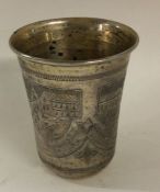 A Russian silver and niello beaker. Marked to base