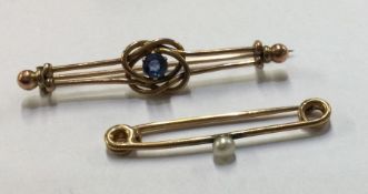 A small pearl brooch together with one other. Appr