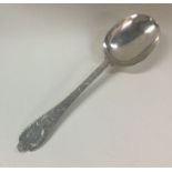 A good Georgian style lace back silver spoon. Lond