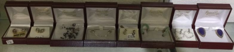 Eight pairs of silver earrings. Est. £20 - £30.