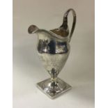 A good George III silver cream jug with wriggle wo