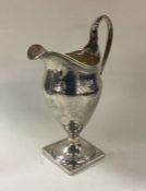 A good George III silver cream jug with wriggle wo