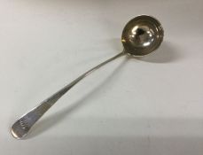 SCOTTISH PROVINCIAL: A Georgian silver sauce ladle