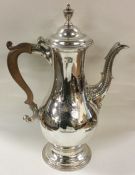 A fine quality George III crested silver coffee po