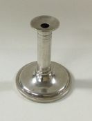 A miniature silver toy candlestick. Circa 1900.